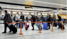 中国多地入境旅客顺利通关 航班航线有序复航