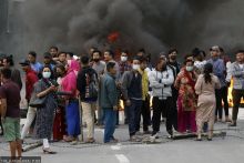 Squatters protest against attempts to demolish illegal structures