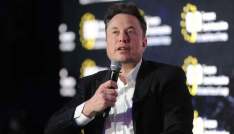 Elon Musk wins official praise for Tesla during surprise visit to China