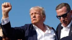 Tragedy at Trump rally upends election campaign - for now 4 hours ago