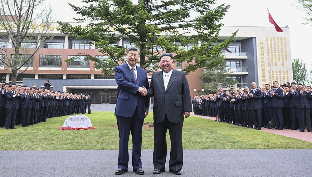 Xi-with-kim-meeting