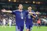 Japan stroll to victory in World Cup's 1,000th game